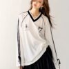 Oversized V-neck black jersey bow Tee