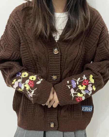 Design and Style Floral Embroidery:Featuring vintage floral embroidery, this cardigan adds a touch of elegance to your autumn wardrobe. Closure Type Single Breasted:Featuring a classic single-breasted closure, this cardigan offers easy wear and a flattering silhouette. Applicable Environment Autumn/Winter:Designed for cooler seasons, this cardigan provides warmth and style during the autumn and winter months. Applicable People Plus Size Women:Tailored for plus size women, this cardigan offers a loose-fitting, comfortable V-neck design. Eras Sweater|Eras Cardigan|Material Composition Acrylic & Cotton:Crafted with a blend of acrylic and cotton, this cardigan offers a soft, medium stretch for ultimate comfort.