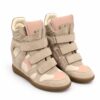 Beige high-top wedge sneakers with cream panels, blush pink accents, three front straps and brown soles.